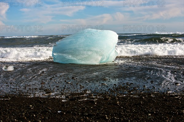 Glacier melting on arctic beach