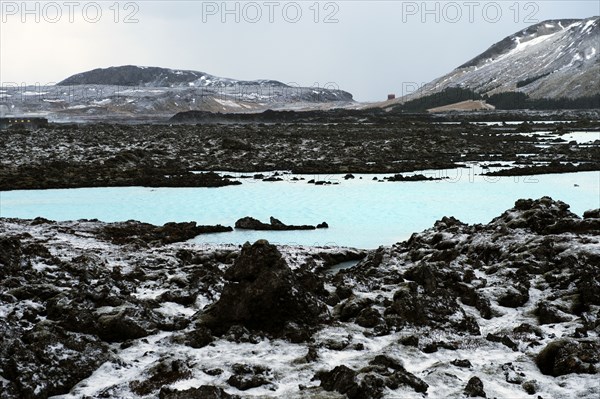 Still lake in arctic landscape