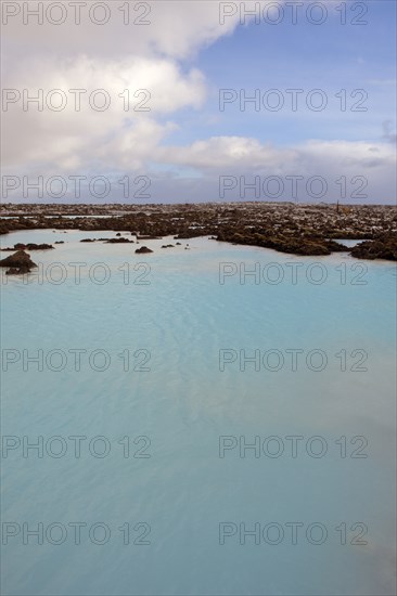 Still lake in arctic landscape