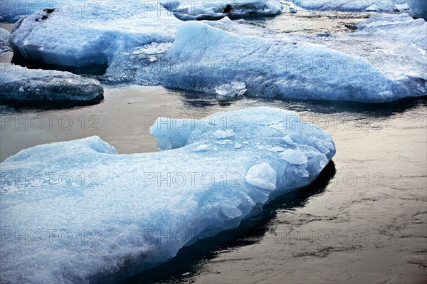Glaciers floating in arctic water