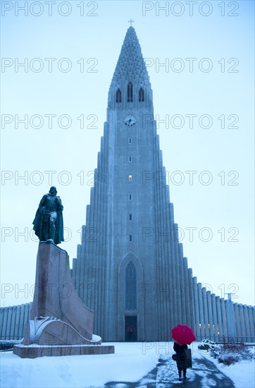 Statue outside monument in snowy landscape