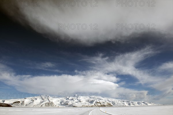 Snow covered mountain in rural landscape