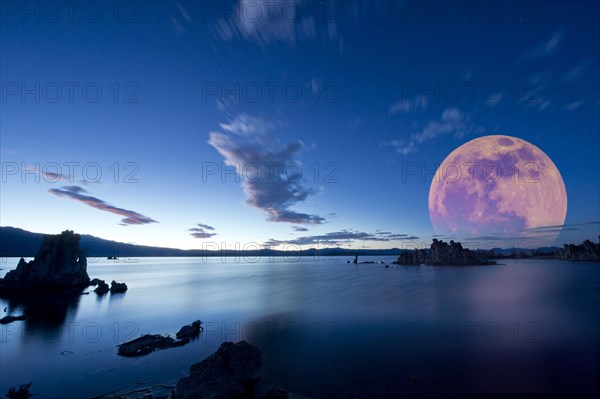 Moon over rock formation at Mono Lake