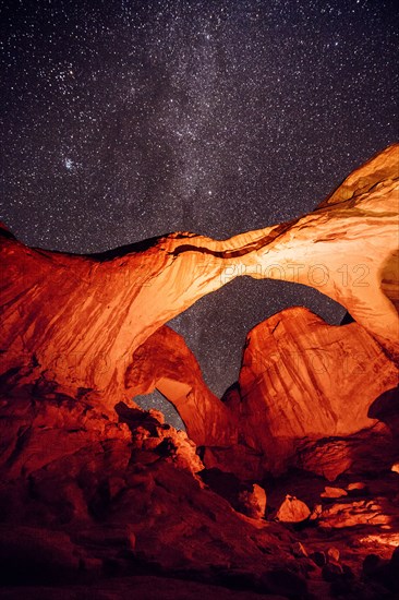 Illuminated rocks at night in Arches National Park