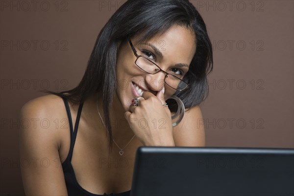 Mixed Race woman wearing eyeglasses