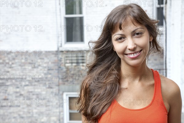 Smiling mixed race woman