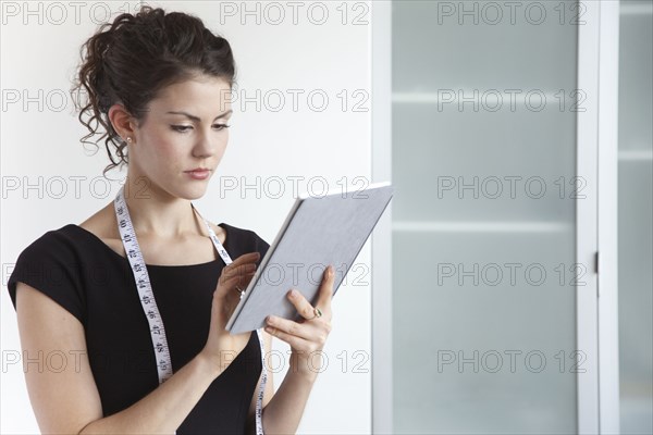 Businesswoman using digital tablet