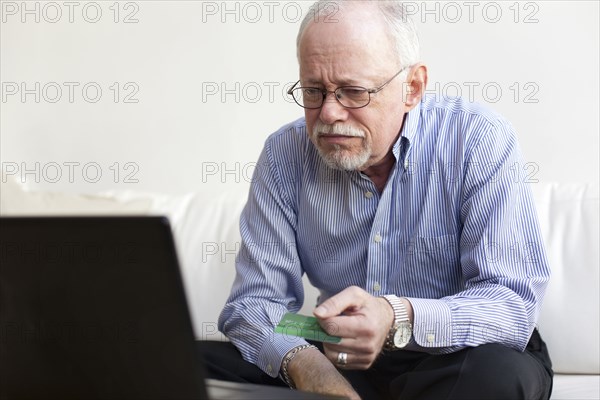 Caucasian man shopping online