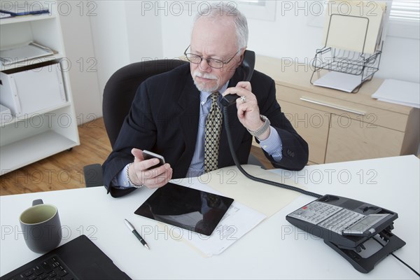 Caucasian businessman working in office