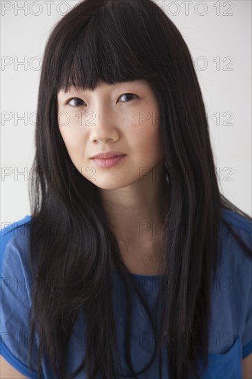 Chinese woman with serious face