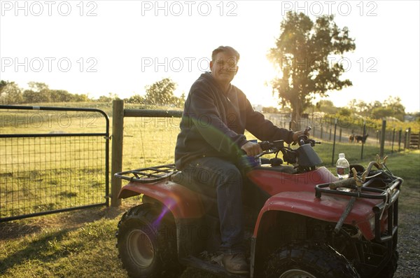 Caucasian man riding leisure vehicle