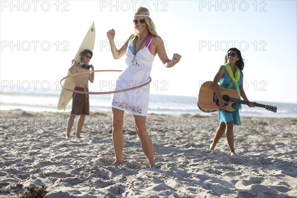 Friends playing on beach