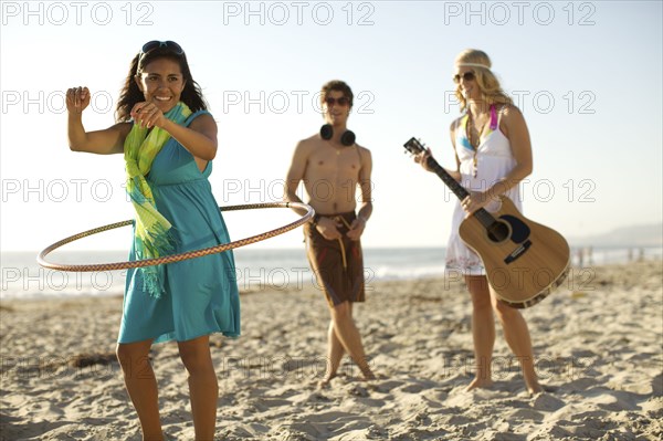 Friends playing on beach