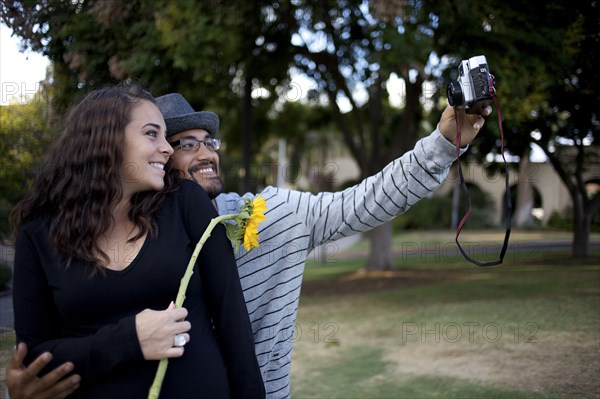 Couple taking self-portrait