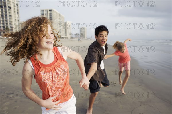 Friends playing on beach