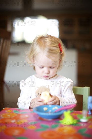 Hungry Caucasian girl eating food