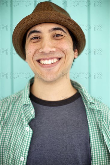 Smiling Pacific Islander man