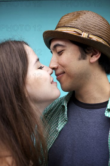 Happy couple smiling at one another