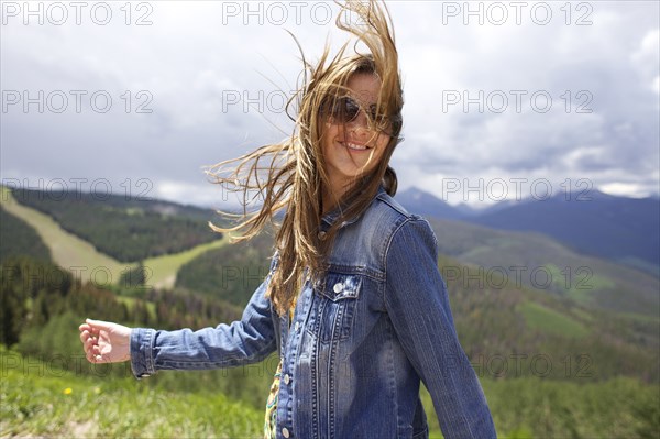 Smiling woman walking outdoors