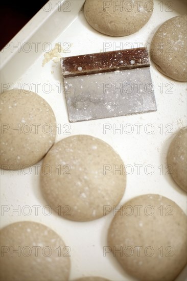 Raw bread dough on tray