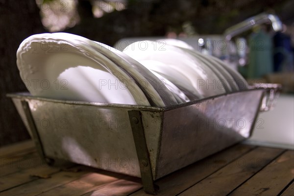 Plates drying in drainer