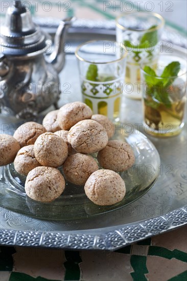 Macaroons and tea on tray