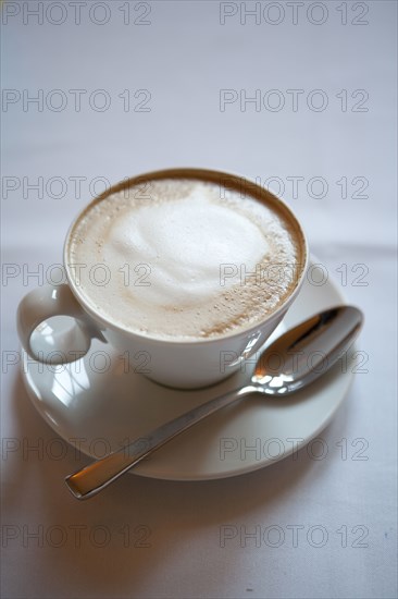 Close up of latte in coffee cup