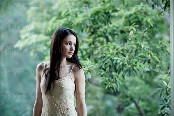 Elegant Caucasian woman standing outdoors