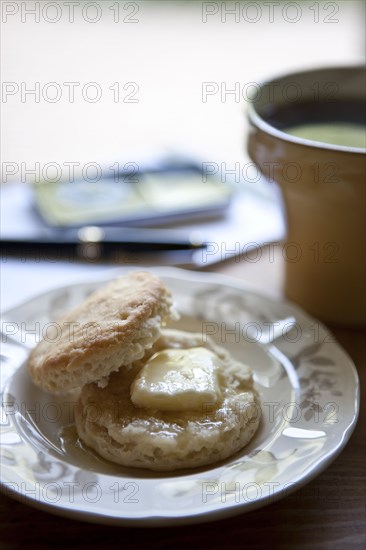 Butter melting on biscuit