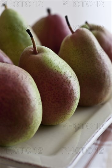 Ripe pears on platter