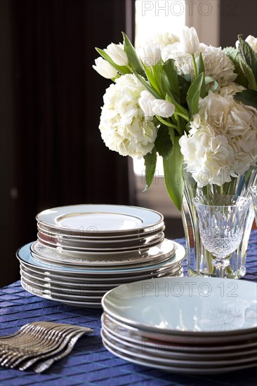 Plates and silverware on table