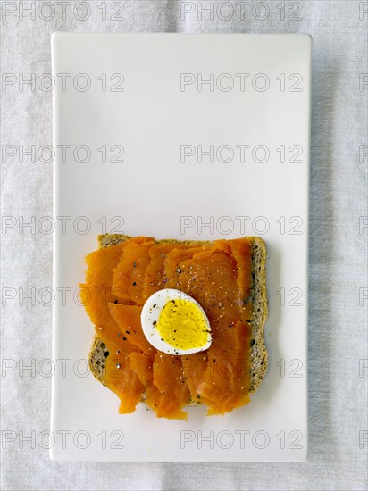 Lox and hard boiled egg on bread