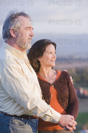 Hispanic couple holding hands