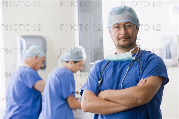 Surgeons scrubbing in before operating