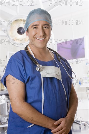 Hispanic surgeon in operating room