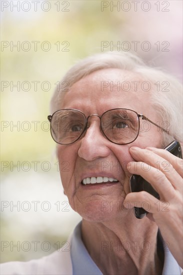 Senior Chilean man talking on cell phone