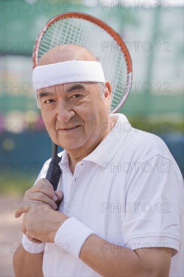 Chilean man playing tennis