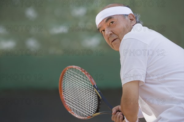 Chilean man playing tennis