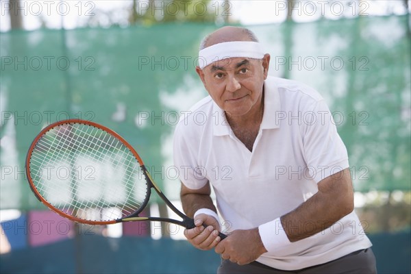 Chilean man playing tennis