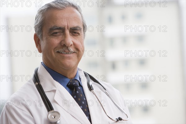 Smiling Hispanic doctor