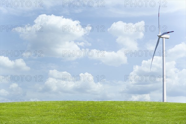 Wind turbine in field