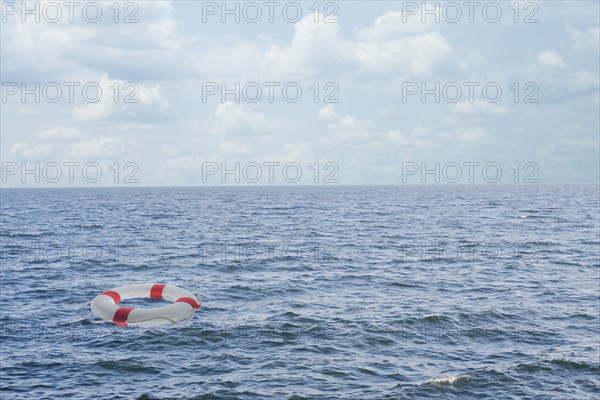 Life preserver floating in open ocean