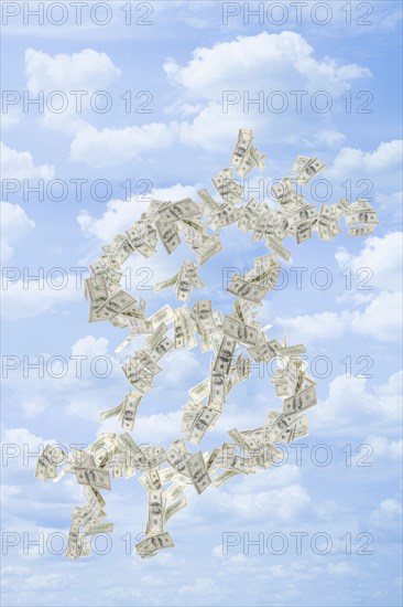 Illustration of dollar bills making dollar sign in sky