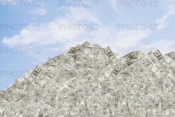 Illustration of mountain of dollar bills