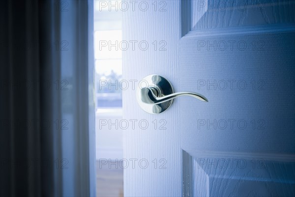 Close up of handle on open door