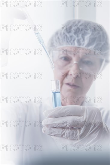 Hispanic scientist working in lab