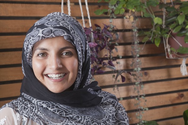 Hispanic woman wearing headscarf