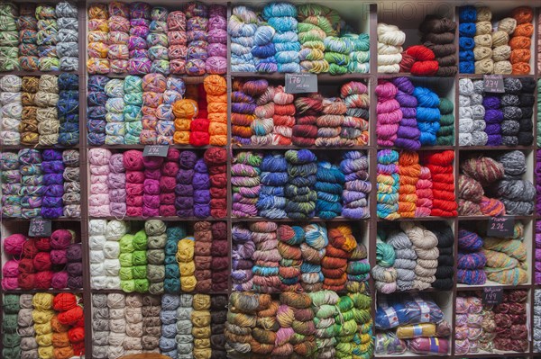 Shelves full of yarn at store