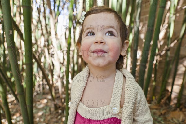 Smiling girl looking up