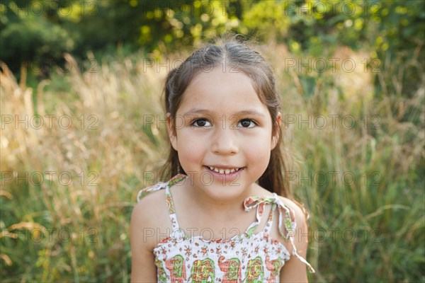 Smiling girl in field